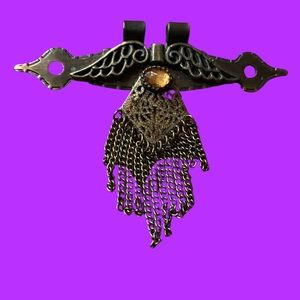 Steampunk Brass and metal tone pendant with gold stone.